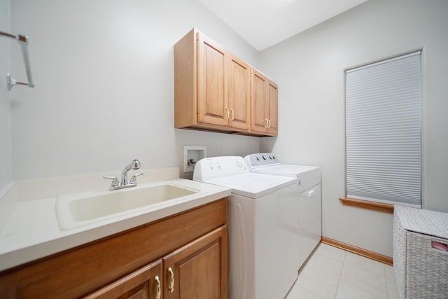 6962 Whitetail Ln, Westerville, OH 43082 - laundry room featuring cabinet space, separate washer and dryer, light tile patterned floors, and baseboards