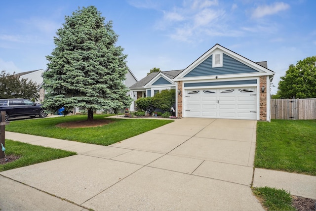 5718 Brook Hollow Dr, Hilliard, OH 43026 - view of front facade featuring brick siding, concrete driveway, and a garage