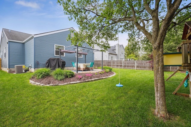 5718 Brook Hollow Dr, Hilliard, OH 43026 - view of yard with a patio area, central AC unit, and a playground