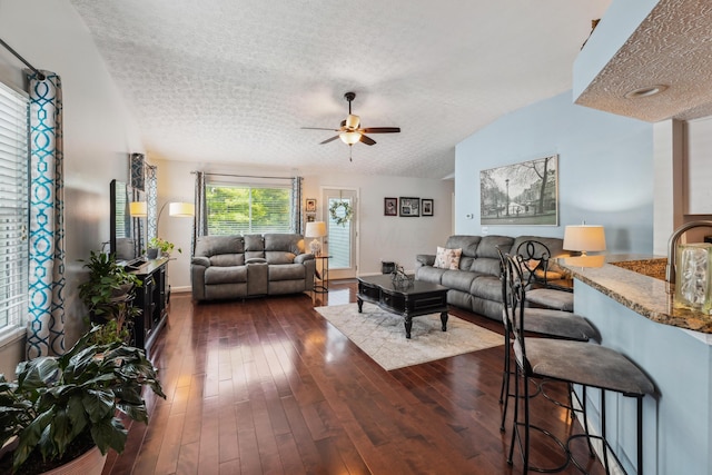 5718 Brook Hollow Dr, Hilliard, OH 43026 - living room with a textured ceiling, ceiling fan, and dark wood-type flooring