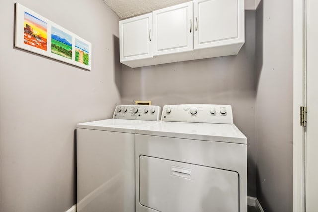5718 Brook Hollow Dr, Hilliard, OH 43026 - laundry area with cabinet space and washer and dryer