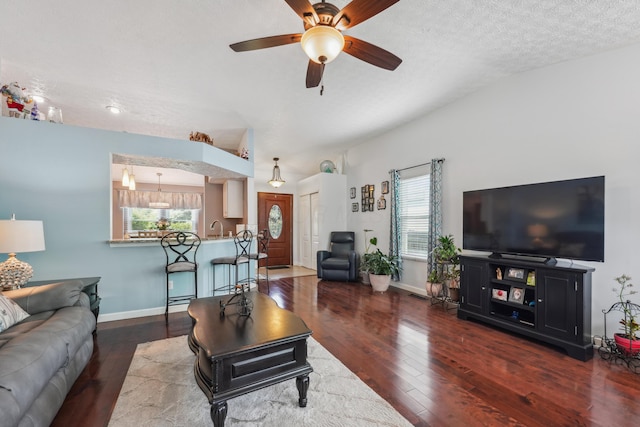 5718 Brook Hollow Dr, Hilliard, OH 43026 - living area with hardwood / wood-style floors, a ceiling fan, plenty of natural light, and a textured ceiling