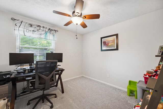5718 Brook Hollow Dr, Hilliard, OH 43026 - home office featuring ceiling fan, a textured ceiling, light colored carpet, and baseboards