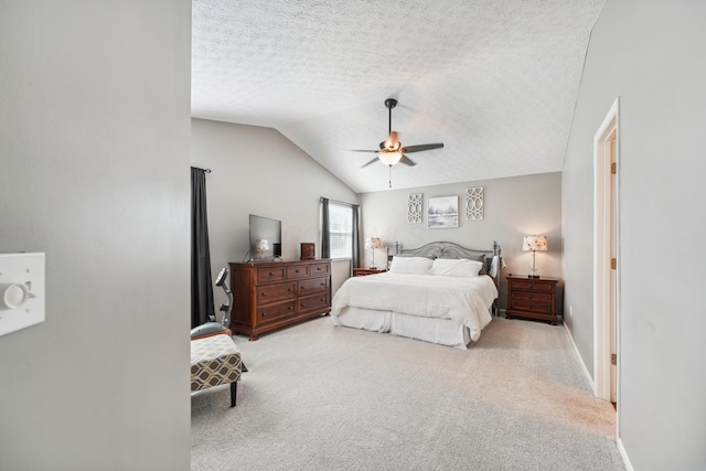 5718 Brook Hollow Dr, Hilliard, OH 43026 - carpeted bedroom featuring vaulted ceiling, a textured ceiling, ceiling fan, and baseboards