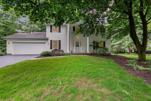 8723 Ramblewood Ct, Pickerington, OH 43147 - view of front of home with driveway, a garage, and a front lawn