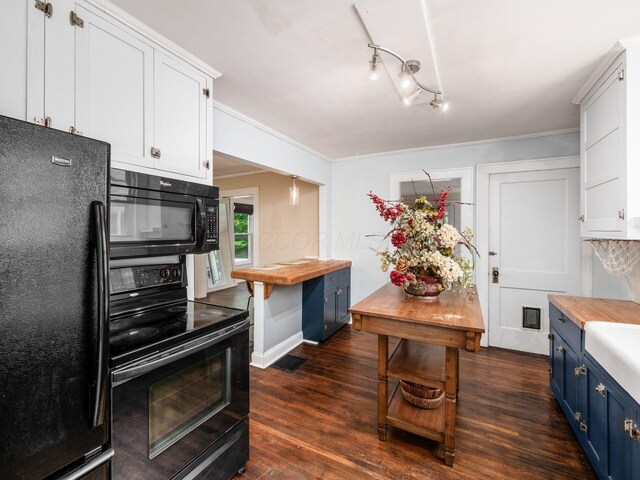 34 Columbus Ave, Delaware, OH 43015 - kitchen with black appliances, blue cabinetry, butcher block counters, dark wood-style flooring, and ornamental molding