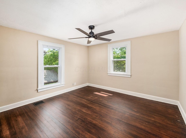 34 Columbus Ave, Delaware, OH 43015 - unfurnished room with baseboards, plenty of natural light, a ceiling fan, and hardwood / wood-style flooring