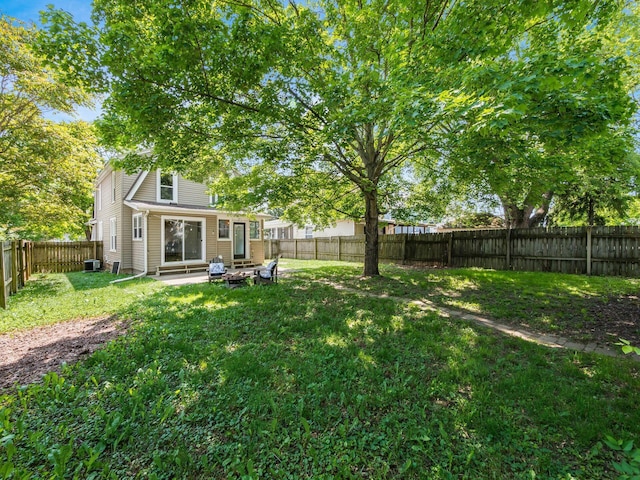 34 Columbus Ave, Delaware, OH 43015 - view of yard featuring entry steps, a patio area, and central AC