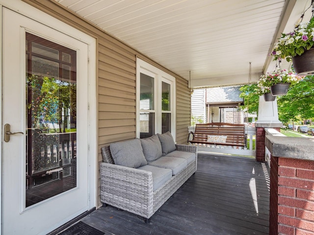 34 Columbus Ave, Delaware, OH 43015 - wooden porch with outdoor lounge area