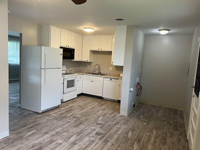 1562 Argus Rd, Columbus, OH 43227 - kitchen featuring white appliances, a sink, dark wood finished floors, white cabinetry, and light countertops