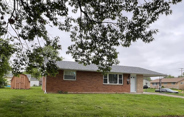 1562 Argus Rd, Columbus, OH 43227 - single story home featuring brick siding, a front lawn, and an attached carport
