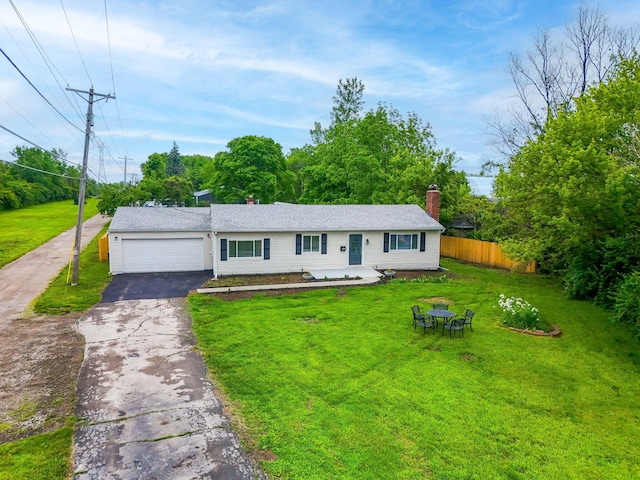 3998 Scioto Darby Creek Rd, Hilliard, OH 43026 - ranch-style house with asphalt driveway, an attached garage, and a chimney