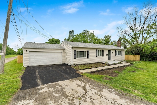 3998 Scioto Darby Creek Rd, Hilliard, OH 43026 - ranch-style house with asphalt driveway, a garage, and a chimney