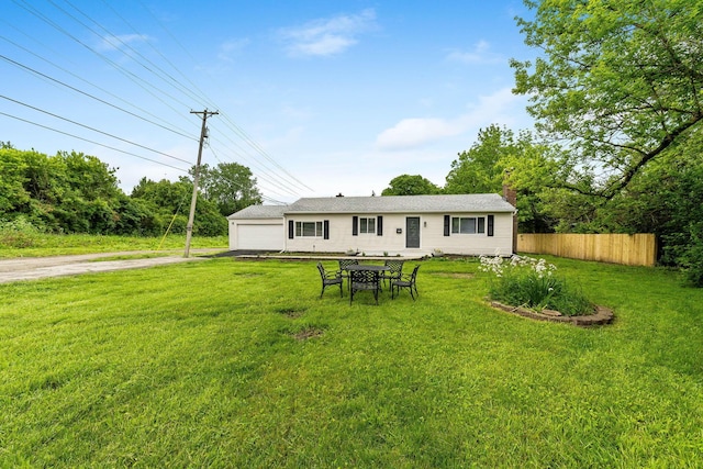 3998 Scioto Darby Creek Rd, Hilliard, OH 43026 - back of house featuring a detached garage and a chimney