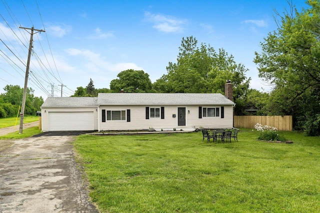 3998 Scioto Darby Creek Rd, Hilliard, OH 43026 - ranch-style home with driveway, an attached garage, and a chimney