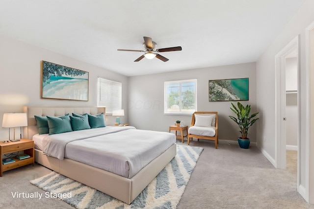 3998 Scioto Darby Creek Rd, Hilliard, OH 43026 - bedroom with light carpet, baseboards, and a ceiling fan