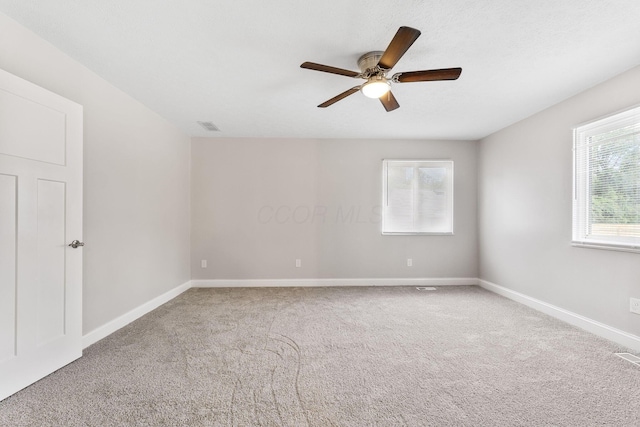 3998 Scioto Darby Creek Rd, Hilliard, OH 43026 - empty room with carpet, a ceiling fan, and baseboards