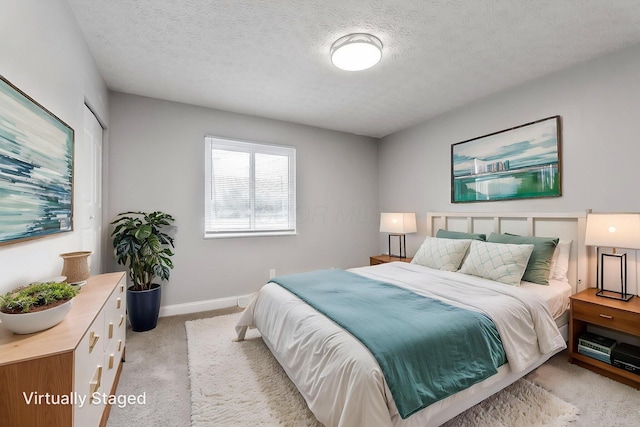 3998 Scioto Darby Creek Rd, Hilliard, OH 43026 - carpeted bedroom with baseboards and a textured ceiling