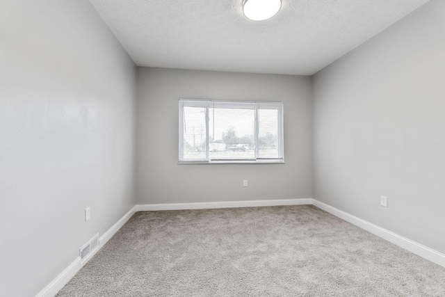 3998 Scioto Darby Creek Rd, Hilliard, OH 43026 - carpeted empty room featuring a textured ceiling and baseboards