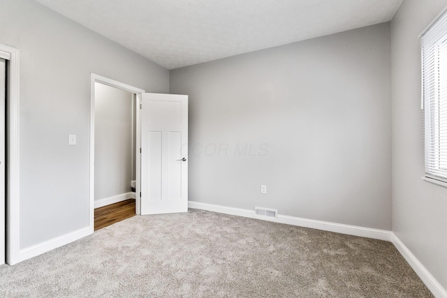 3998 Scioto Darby Creek Rd, Hilliard, OH 43026 - unfurnished bedroom with carpet flooring and baseboards