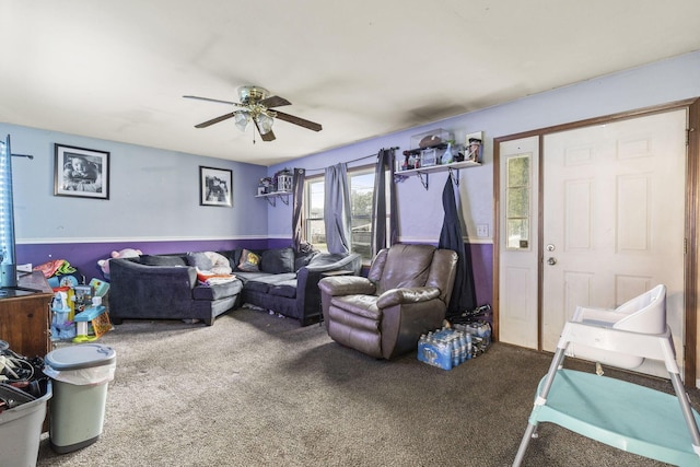 217 N Yencer St, Baltimore, OH 43105 - carpeted living area with a ceiling fan and wainscoting