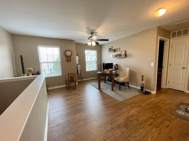6231 Red Glare Dr Unit 287, Galloway, OH 43119 - home office featuring a ceiling fan, wood finished floors, and baseboards