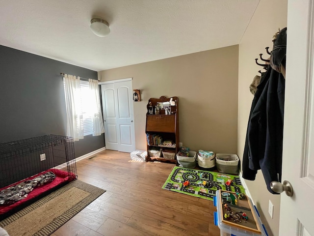 6231 Red Glare Dr Unit 287, Galloway, OH 43119 - bedroom featuring wood-type flooring and baseboards