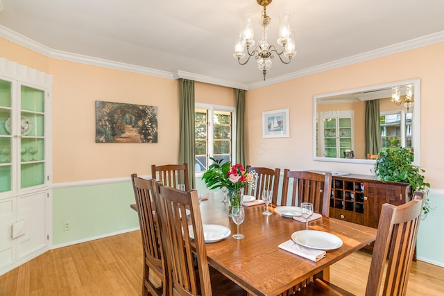 1117 E Vine St, Mount Vernon, OH 43050 - dining room featuring a chandelier, light wood-style floors, ornamental molding, and baseboards