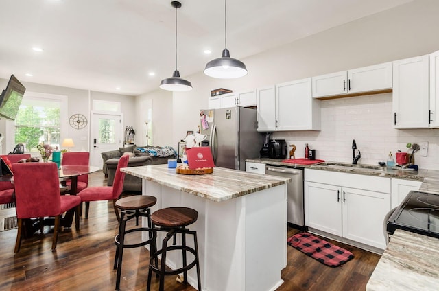 626-628 Wilson Ave, Columbus, OH 43205 - kitchen with appliances with stainless steel finishes, a sink, dark wood-type flooring, open floor plan, and white cabinetry