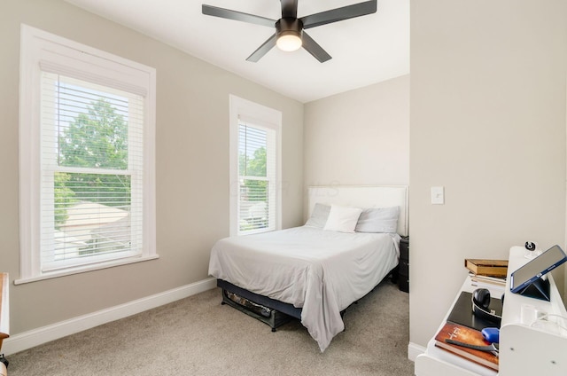 626-628 Wilson Ave, Columbus, OH 43205 - bedroom featuring light carpet, baseboards, and ceiling fan