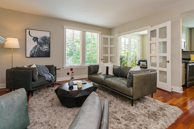 873 S Pearl St, Columbus, OH 43206 - living room with dark wood-type flooring and baseboards