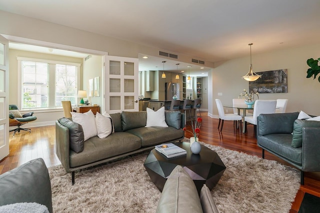 873 S Pearl St, Columbus, OH 43206 - living area featuring wood finished floors and baseboards