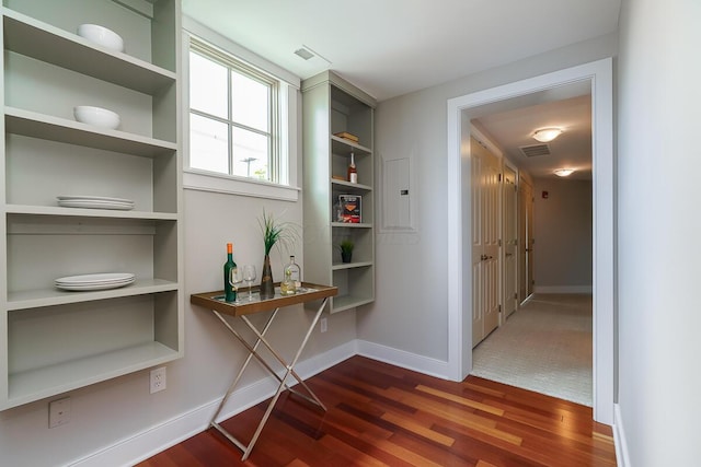 873 S Pearl St, Columbus, OH 43206 - corridor with dark wood-style flooring and baseboards