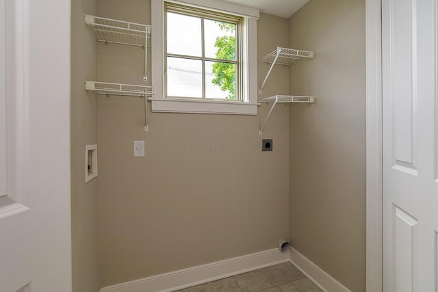 873 S Pearl St, Columbus, OH 43206 - washroom with electric dryer hookup, baseboards, tile patterned flooring, and washer hookup