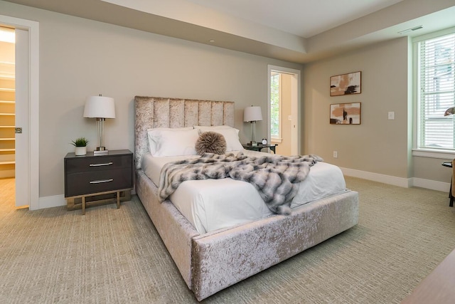 873 S Pearl St, Columbus, OH 43206 - bedroom featuring baseboards, multiple windows, and carpet