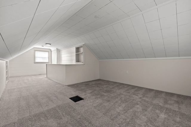 3091 Azelda St, Columbus, OH 43224 - additional living space featuring carpet floors and vaulted ceiling