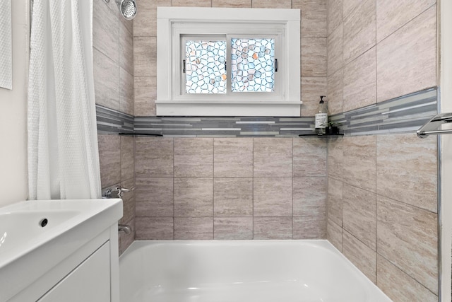 3091 Azelda St, Columbus, OH 43224 - bathroom featuring vanity and shower / bath combo with shower curtain