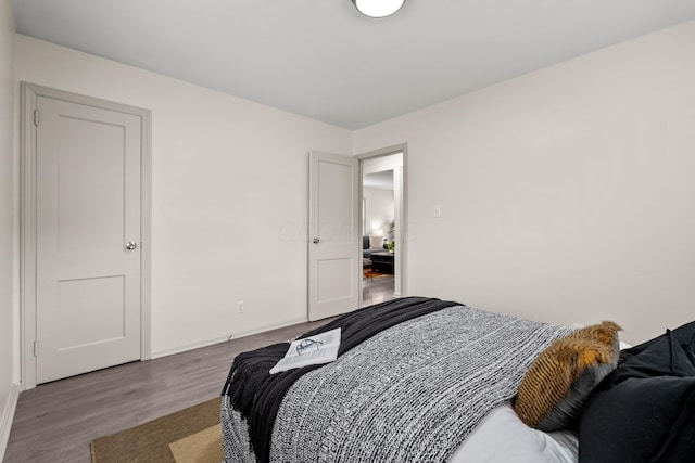 3091 Azelda St, Columbus, OH 43224 - bedroom with wood finished floors and baseboards