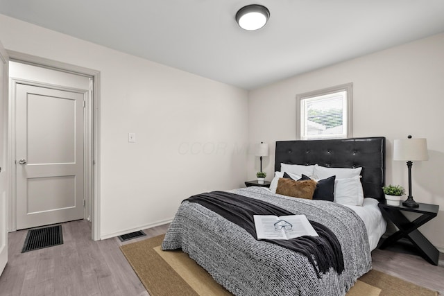 3091 Azelda St, Columbus, OH 43224 - bedroom with wood finished floors and baseboards