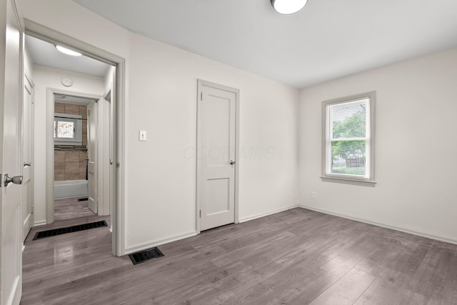 3091 Azelda St, Columbus, OH 43224 - unfurnished bedroom with wood finished floors and baseboards