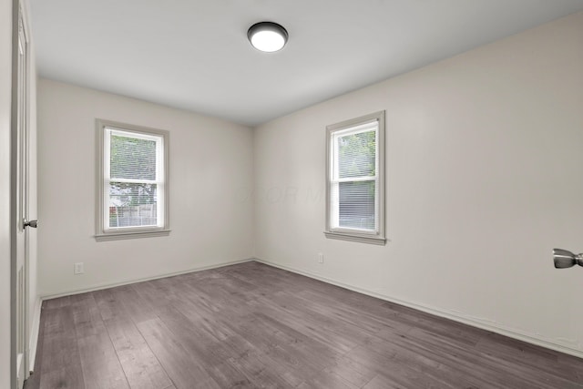 3091 Azelda St, Columbus, OH 43224 - spare room with dark wood-style floors and baseboards