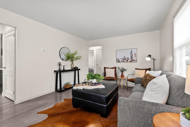 3091 Azelda St, Columbus, OH 43224 - living area featuring wood finished floors and baseboards