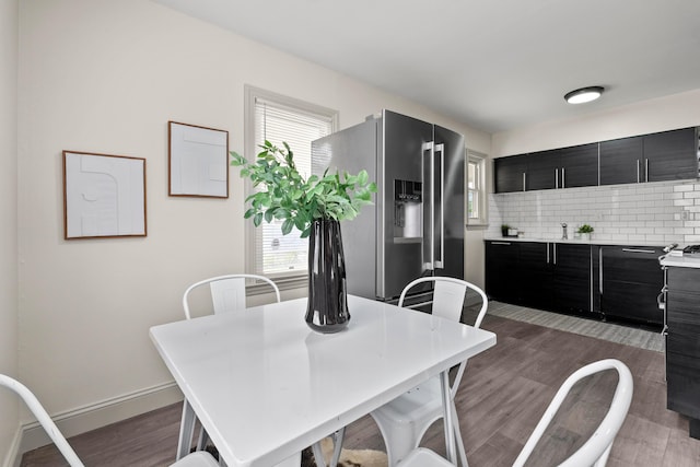 3091 Azelda St, Columbus, OH 43224 - dining room with wood finished floors and baseboards