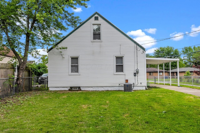 3091 Azelda St, Columbus, OH 43224 - view of home's exterior with cooling unit, an attached carport, and driveway
