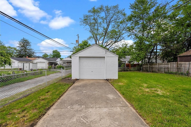 3091 Azelda St, Columbus, OH 43224 - detached garage featuring concrete driveway