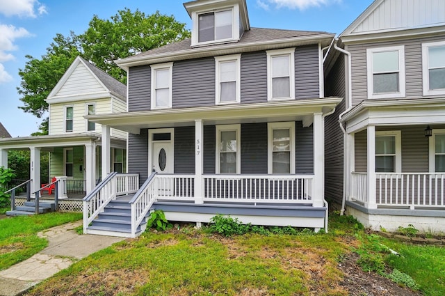 517 S Champion Ave, Columbus, OH 43205 - traditional style home featuring covered porch and roof with shingles
