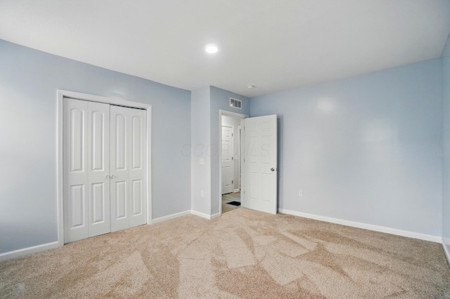 517 S Champion Ave, Columbus, OH 43205 - unfurnished bedroom with carpet floors, baseboards, and a closet