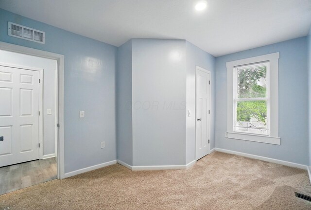 517 S Champion Ave, Columbus, OH 43205 - spare room with light colored carpet and baseboards