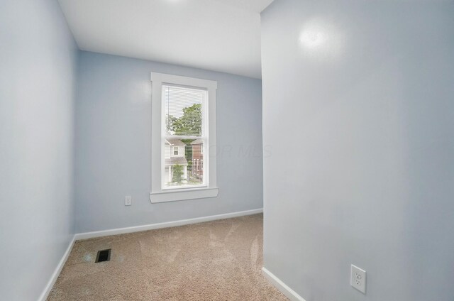 517 S Champion Ave, Columbus, OH 43205 - carpeted empty room with baseboards
