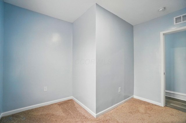 517 S Champion Ave, Columbus, OH 43205 - spare room featuring carpet flooring, baseboards, and a smoke detector